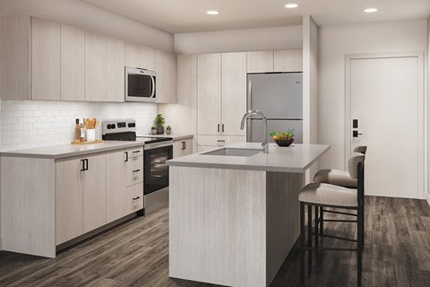 a kitchen with white cabinets and a counter top